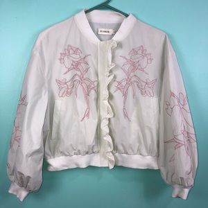 White bomber jacket with pink floral stitching